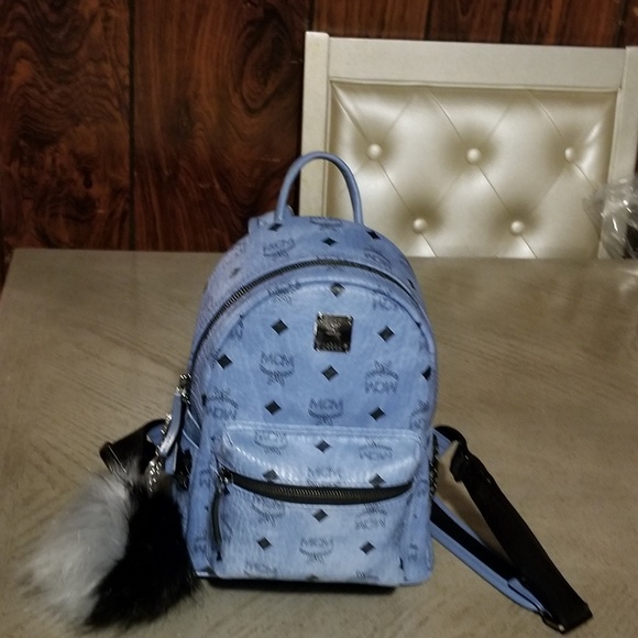 MCM Handbags - Authentic MCM mini backpack.....PRICE IS FINAL!